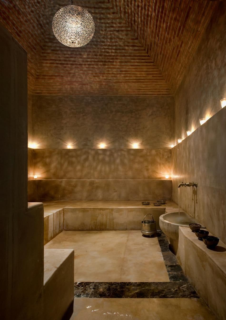 Experience the calming ambiance of this beautifully tiled hammam space with its gentle fountain and inviting warmth. #MoroccanHammam #TraditionalBathhouse #SpaDay #Relaxation #MoroccanCulture Moroccan House, Moroccan Hammam Design, Traditional Hammam Design, Moroccan Hamam, Traditional Hammam Room, Moroccan Hammam Bath, Hammam Aesthetic, Traditional Hammam Bath, Traditional Moroccan Hammam, marocain, zellige